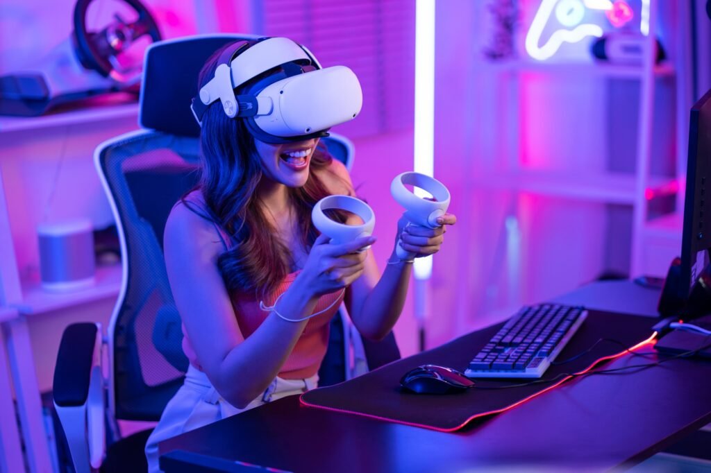 Asian young Esport woman gamer use technology VR glasses and play game.