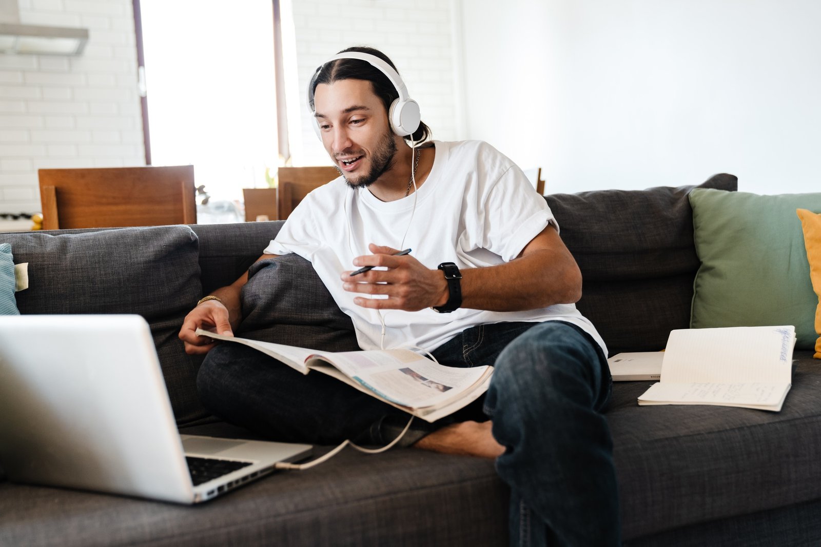 Confident young man wearing headphones