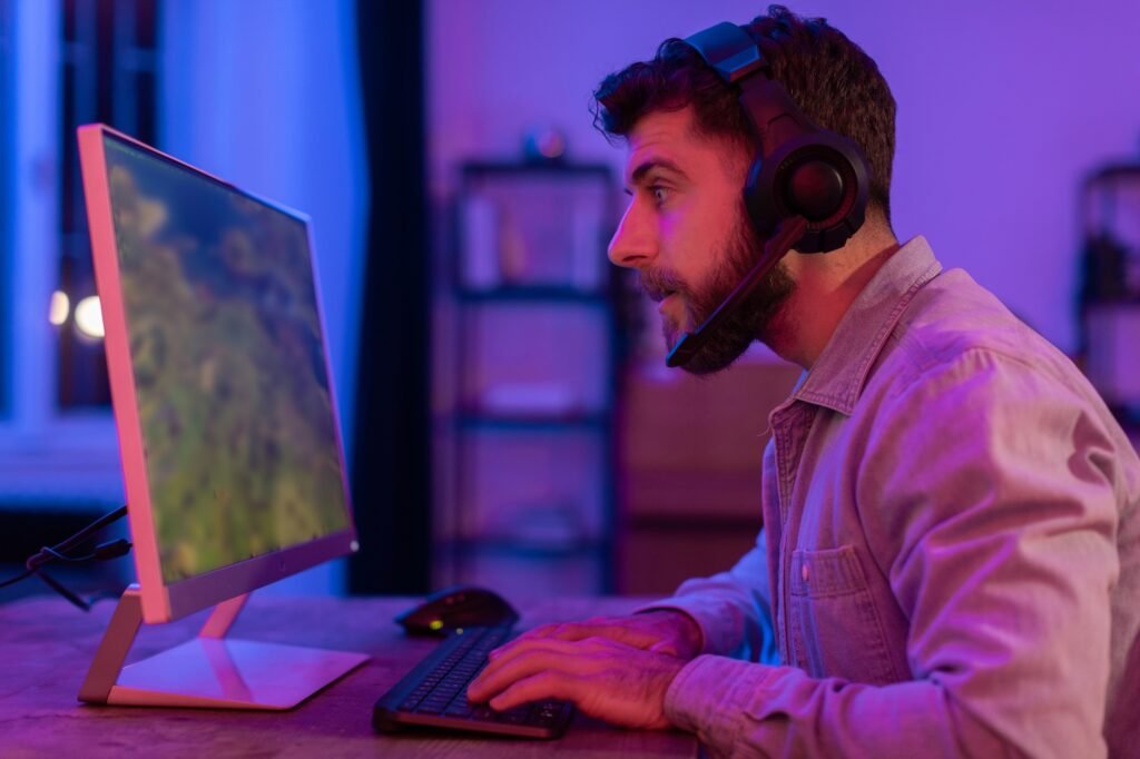Gamer at computer playing a first-person game