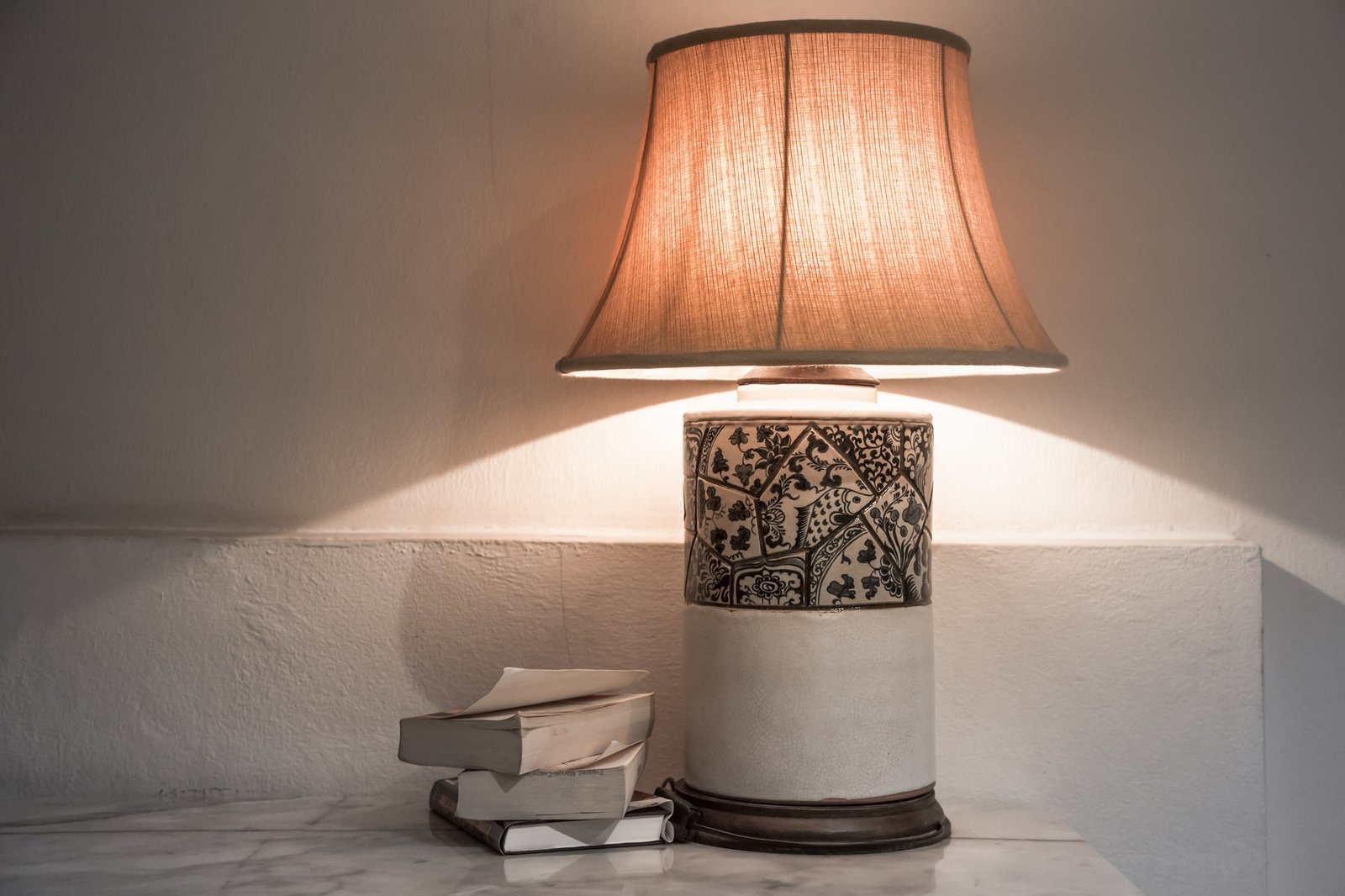 lamp with books on the table